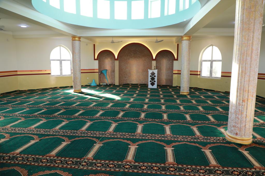 The Minister of MOHIA, leading a delegation to assess religious and administrative matters and to visit the martyrs' shrine in Dasht-e-Leili, traveled to Jowzjan province.